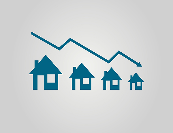 a line of houses with a rising arrow.