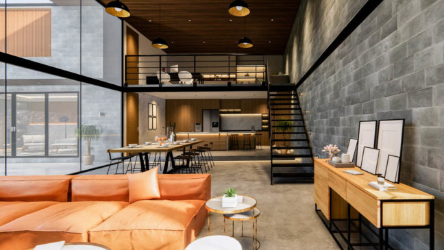 a living room filled with furniture and a staircase